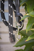 Penelope Strick in black rope and leather